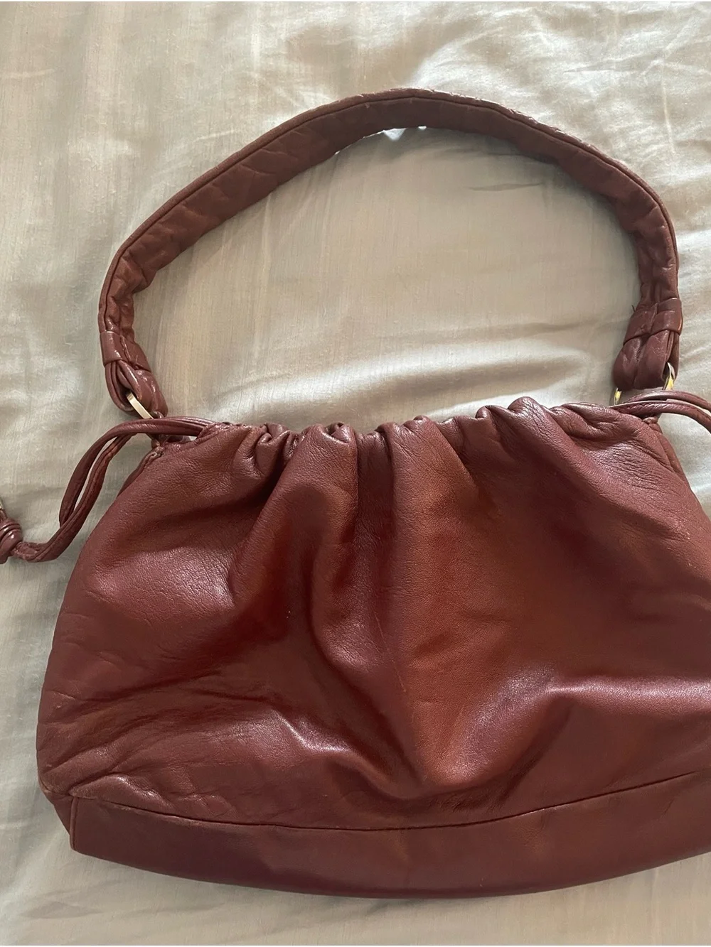 Vintage Franco Sarto Gathered Shoulder Boho Bag in burgundy leather.